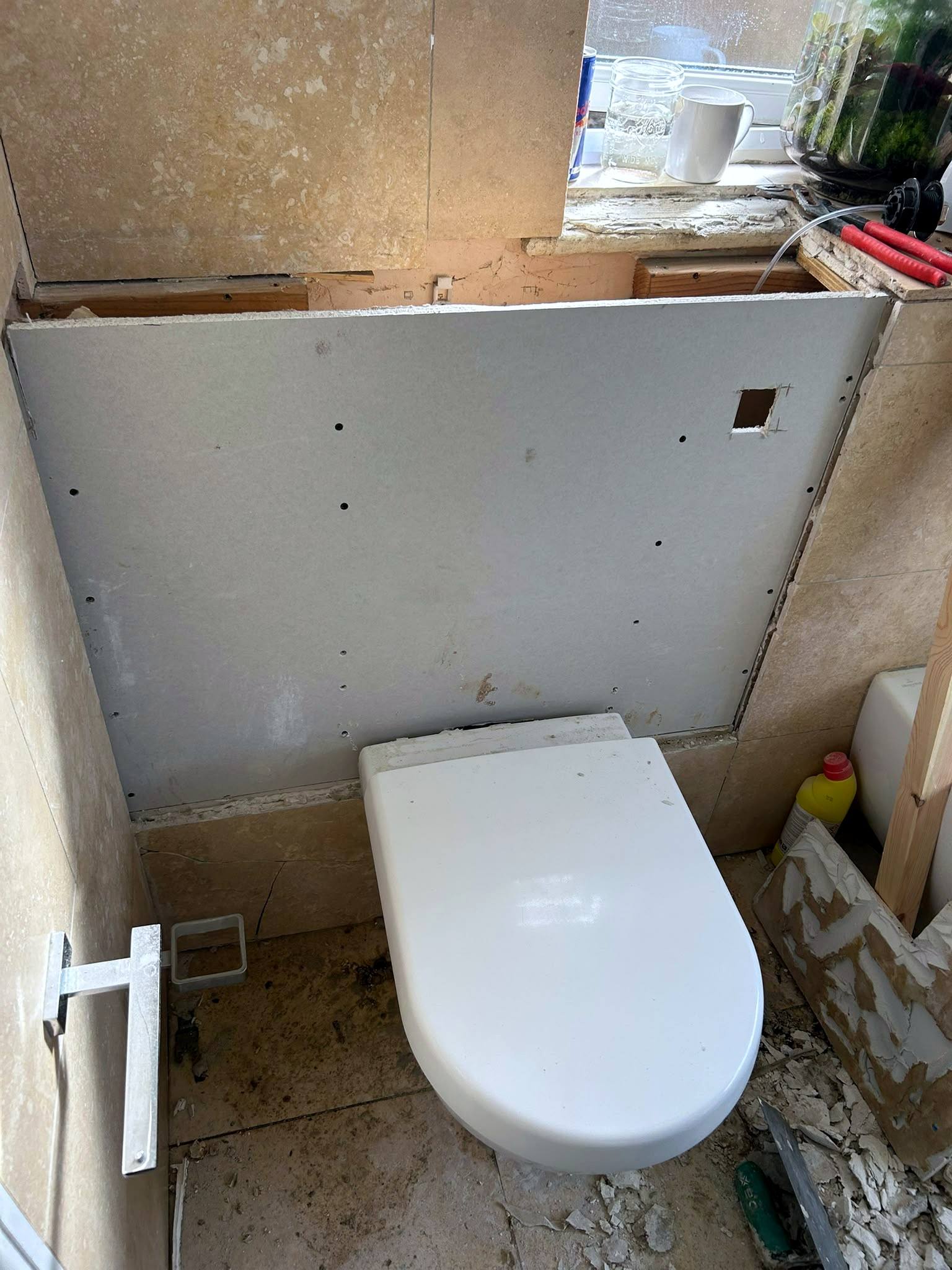WC frame boarded and ready for tiling