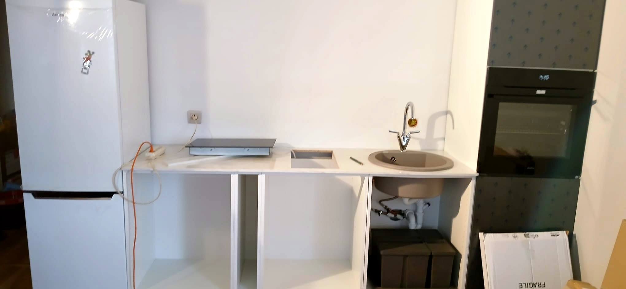 Base units set level before the worktop is cut