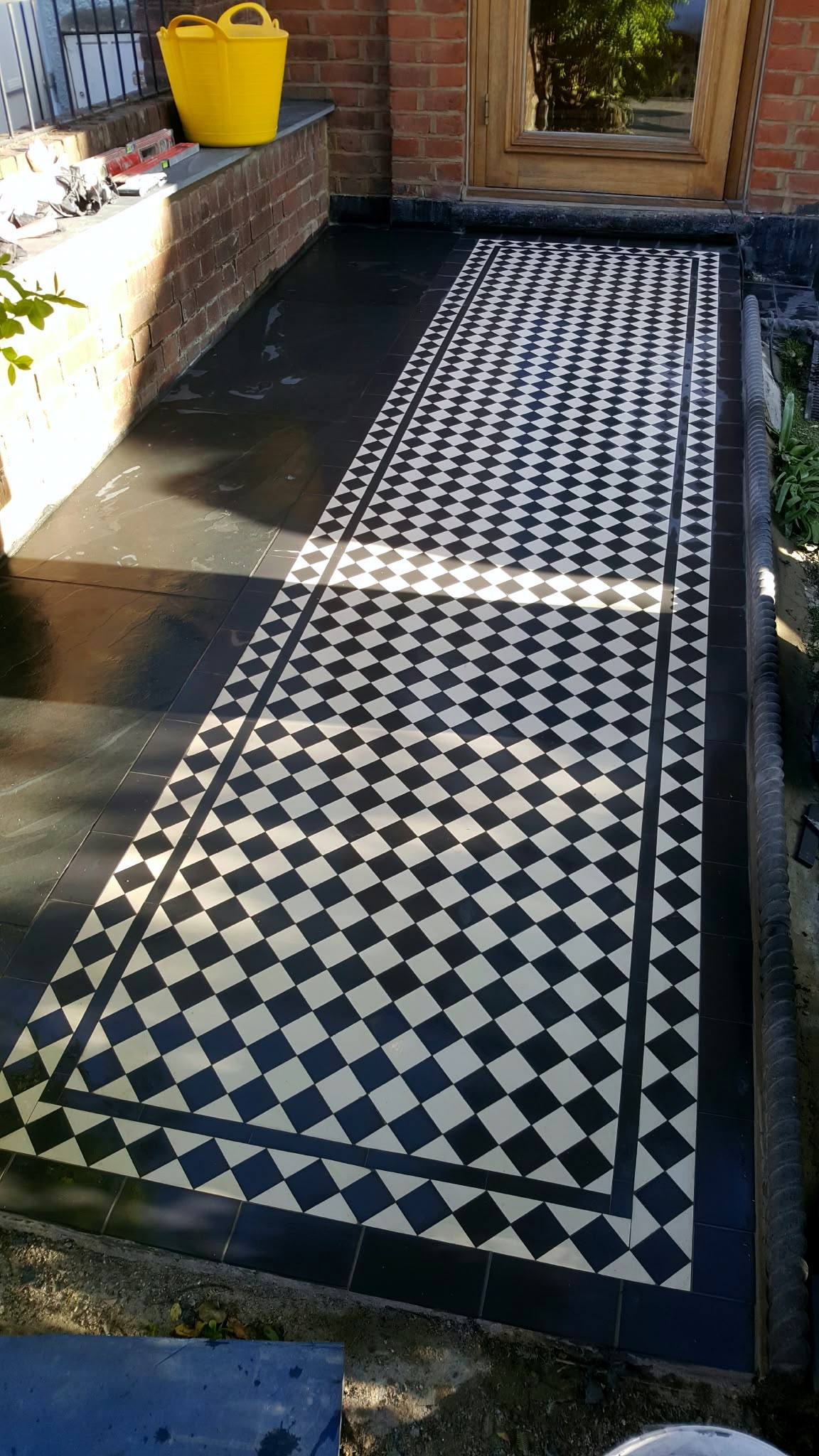Victorian black and white tiled front path with border