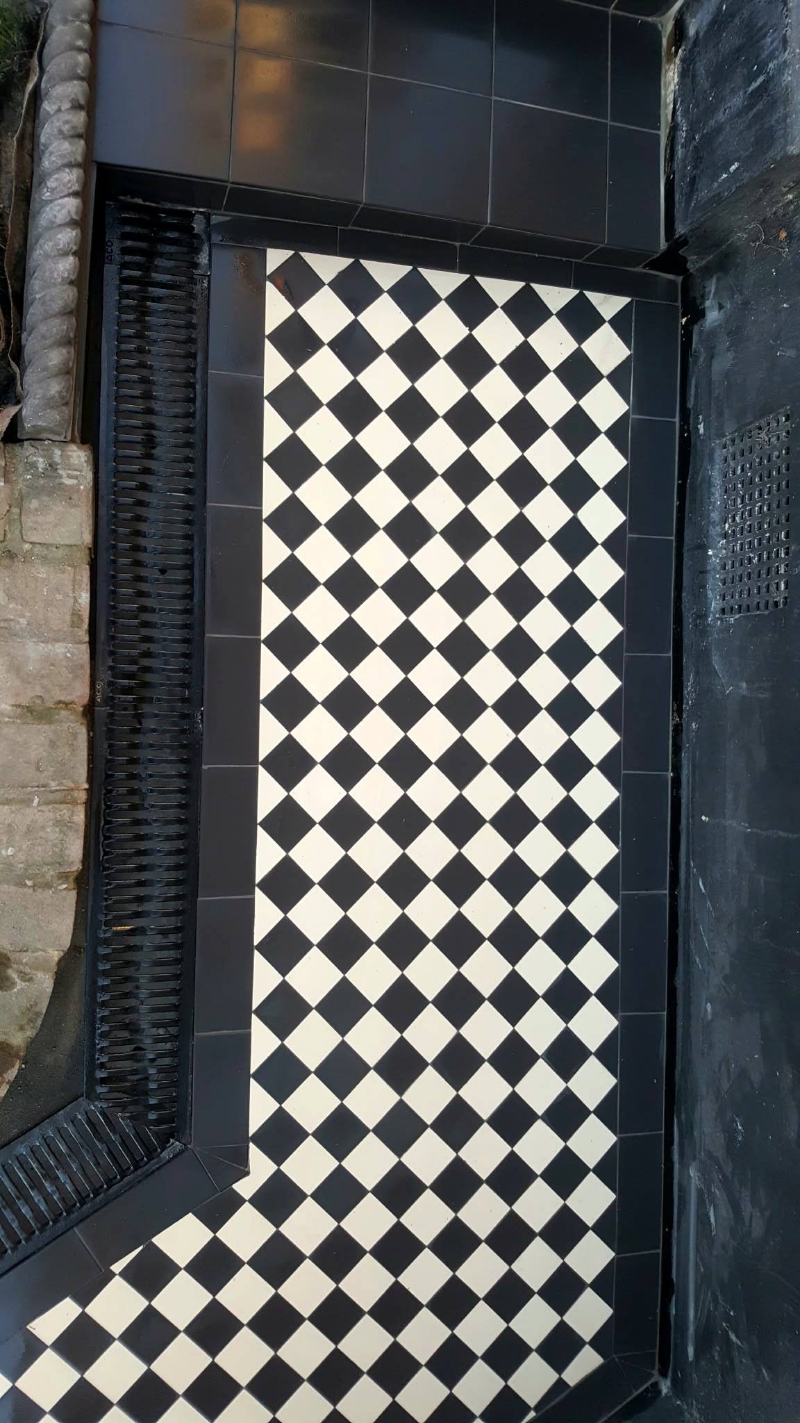Chequerboard path with a black tiled step