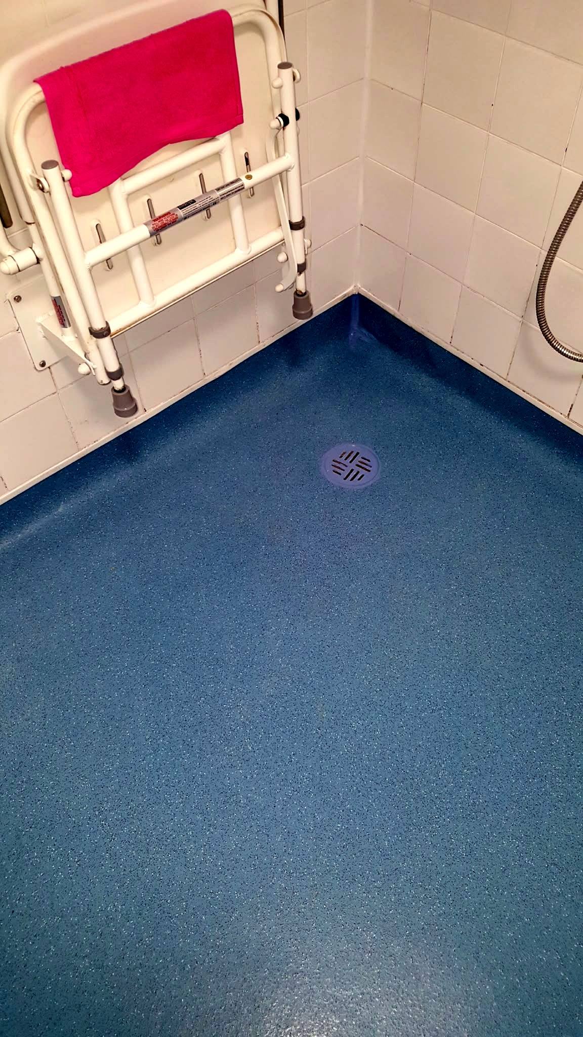 The same wet room with new slip-resistant safety flooring